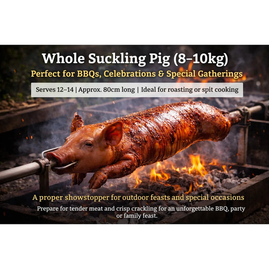 Whole Suckling Pig (8–10kg) roasting on a spit over an open fire, ideal for BBQs, celebrations and special gatherings, serving 12 to 14 people with tender meat and crispy crackling.