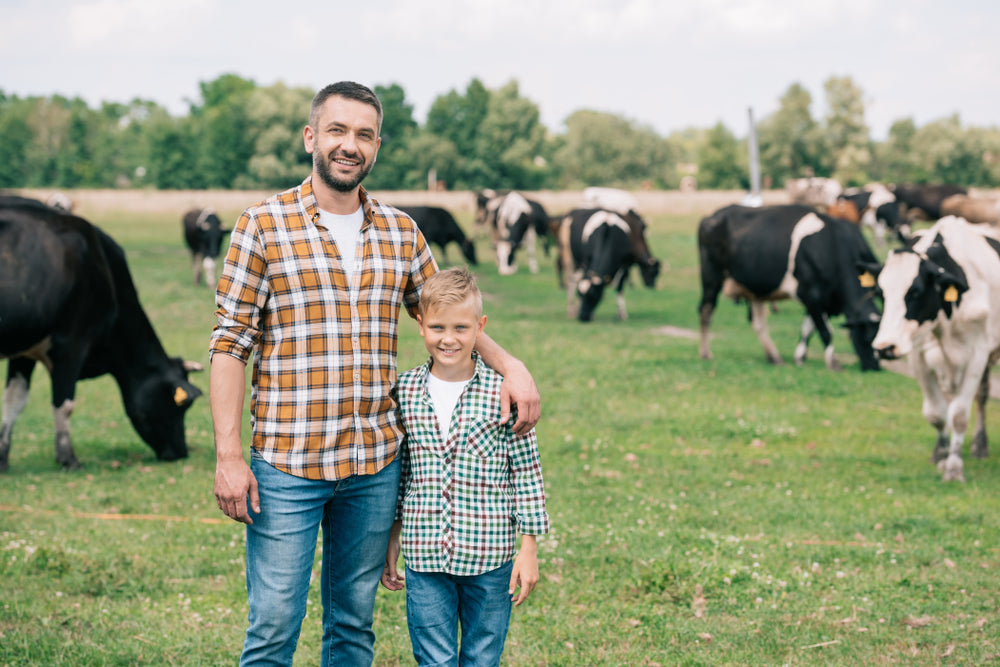 Farmer & Son with cows