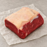 Bromfields Beef 28 Day+ Dry Aged Welsh Rolled Sirloin on white parchment paper