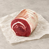 Rolled boneless brisket roasting joint from Bromfields Beef on white parchment paper